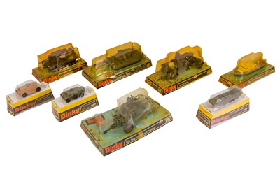 Lot 216 - A GROUP OF EIGHT LATE DINKY MILITARY VEHICLES IN BUBBLE PACKAGING