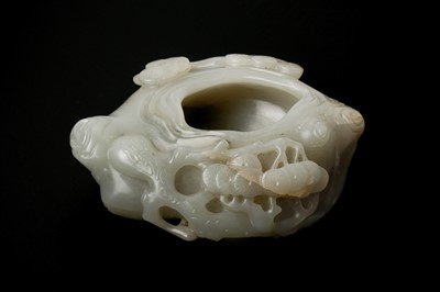 Lot 137 - A SMALL CHINESE CARVED CELADON JADE BRUSH WASHER, XI