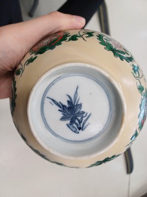 Lot 32 - A CHINESE FAMILLE-VERTE CAFE AU LAIT-GROUND BOWL