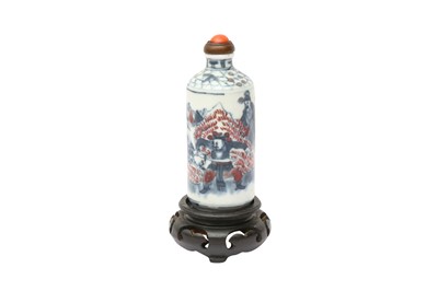 Lot 230 - λ A CHINESE BLUE AND WHITE AND COPPER-RED SNUFF BOTTLE