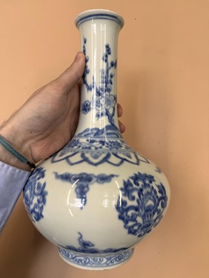 Lot 468 - A CHINESE BLUE AND WHITE 'LOTUS' BOTTLE VASE