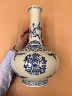 Lot 468 - A CHINESE BLUE AND WHITE 'LOTUS' BOTTLE VASE