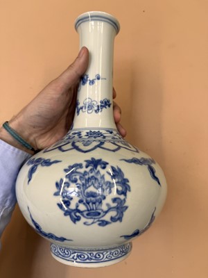 Lot 468 - A CHINESE BLUE AND WHITE 'LOTUS' BOTTLE VASE