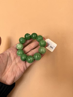 Lot 565 - A CHINESE JADE BRACELET