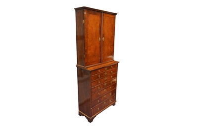 Lot 15 - A FEATHER BANDED WALNUT CABINET ON CHEST CIRCA 1920-1930