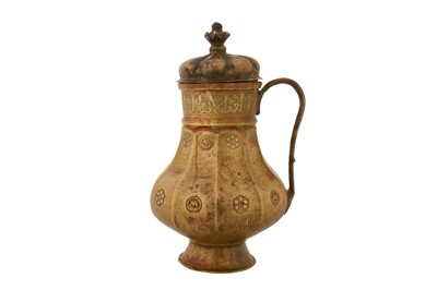 Lot 70 - A 12TH CENTURY PERSIAN SELJUK JUG WITH SILVER AND COPPER INLAY