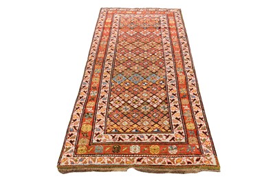 Lot 61 - AN ANTIQUE NORTH-WEST PERSIAN LONG RUG