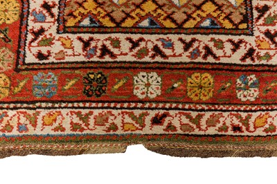 Lot 61 - AN ANTIQUE NORTH-WEST PERSIAN LONG RUG