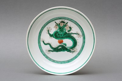 Lot 247 - A CHINESE GREEN-ENAMELLED 'DRAGONS' DISH