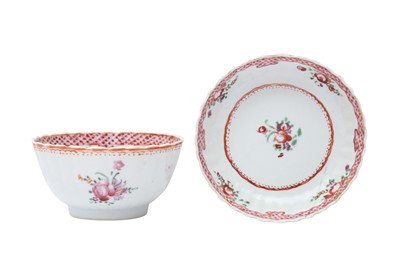 Lot 445 - A CHINESE EXPORT FAMILLE ROSE CUP AND SAUCER