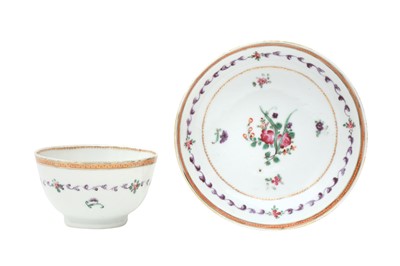 Lot 443 - A CHINESE FAMILLE-ROSE CUP AND SAUCER