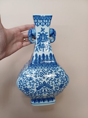 Lot 519 - A CHINESE BLUE AND WHITE 'LOTUS SCROLLS' VASE