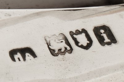 Lot 68 - An Edwardian sterling silver mounted tortoiseshell timepiece or clock, London 1902 by HA