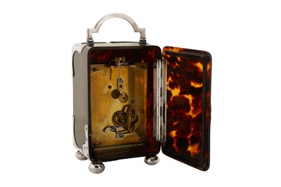 Lot 68 - An Edwardian sterling silver mounted tortoiseshell timepiece or clock, London 1902 by HA