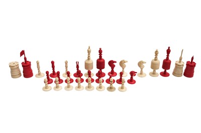 Lot 128 - A COMPLETE SET OF ANTIQUE STAINED BONE CHESSMEN