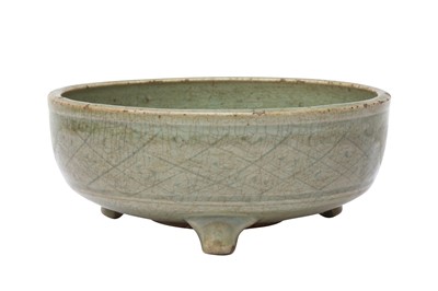 Lot 296 - A CHINESE LONGQUAN CELADON-GLAZED TRIPOD CENSER