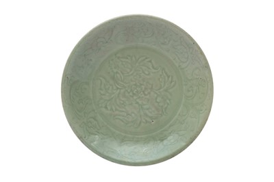 Lot 297 - A CHINESE LONGQUAN CELADON-GLAZED 'PEONY' DISH