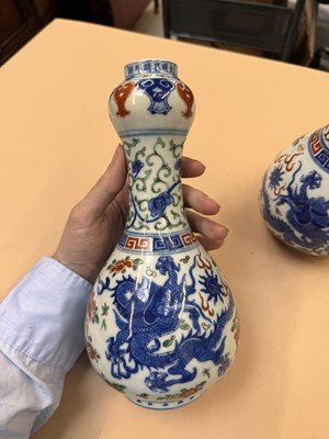 Lot 508 - A PAIR OF CHINESE WUCAI 'DRAGON' VASES