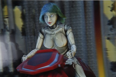 Lot 19 - Richard Counsell b.1968: 3D Lenticular Print of a Female Robot on a Motorbike