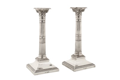 Lot 313 - A pair of Edwardian sterling silver candlesticks, London 1901 by William Hutton and Sons