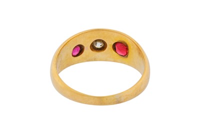 Lot 38 - A THREE-STONE DIAMOND AND RUBY RING