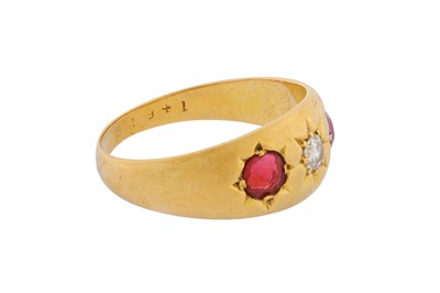 Lot 38 - A THREE-STONE DIAMOND AND RUBY RING