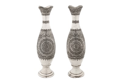 Lot 190 - A pair of mid-20th century Persian (Iranian) silver vases, Isfahan circa 1950 mark of Bagher Parvaresh (c.1910-1978, master 1928)