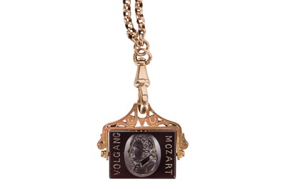 Lot 51 - A MOZART CARNELIAN PENDANT ON A FOB CHAIN NECKLACE