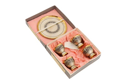 Lot 203 - A boxed late 20th century Russian 875 standard parcel gilt silver and niello vodka cup set, Leningrad post-1958