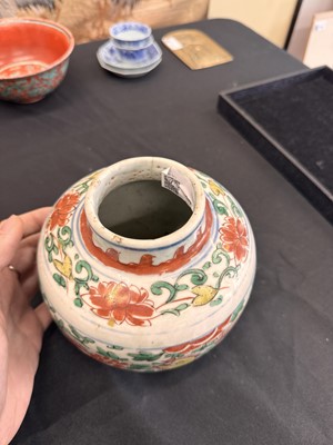 Lot 27 - A CHINESE WUCAI 'LOTUS AND LION DOG' JAR