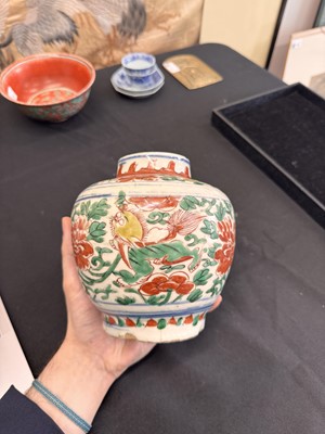 Lot 27 - A CHINESE WUCAI 'LOTUS AND LION DOG' JAR