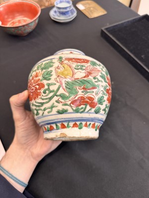 Lot 27 - A CHINESE WUCAI 'LOTUS AND LION DOG' JAR