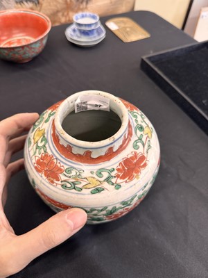 Lot 27 - A CHINESE WUCAI 'LOTUS AND LION DOG' JAR