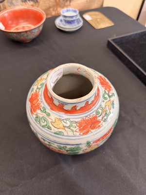 Lot 27 - A CHINESE WUCAI 'LOTUS AND LION DOG' JAR