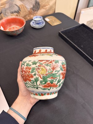 Lot 27 - A CHINESE WUCAI 'LOTUS AND LION DOG' JAR