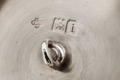 Lot 316 - An Edwardian sterling silver hot water pot, London 1904 by Horace Woodward and Co