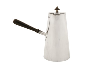 Lot 316 - An Edwardian sterling silver hot water pot, London 1904 by Horace Woodward and Co