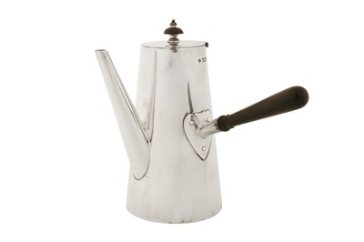 Lot 316 - An Edwardian sterling silver hot water pot, London 1904 by Horace Woodward and Co