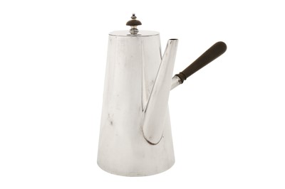 Lot 316 - An Edwardian sterling silver hot water pot, London 1904 by Horace Woodward and Co