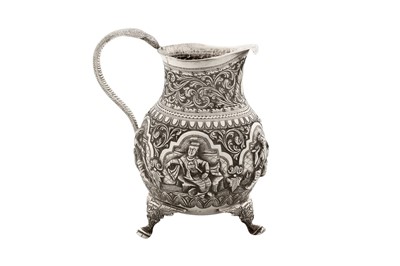 Lot 151 - A late 19th / early 20th century Burmese unmarked silver milk jug, probably Mandalay circa 1900