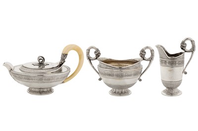 Lot 213 - An early 20th century Austrian 800 standard silver three-piece tea service, Vienna circa 1925 by Rudolf Lammel retailed by Carl Heiss