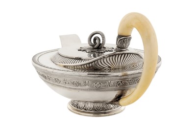 Lot 213 - An early 20th century Austrian 800 standard silver three-piece tea service, Vienna circa 1925 by Rudolf Lammel retailed by Carl Heiss