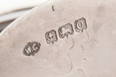 Lot 72 - A cased set of four Edwardian sterling silver and tortoiseshell place card or menu holders, Birmingham 1913 by Comyns