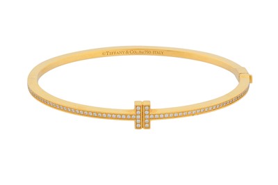 Lot 203 - TIFFANY Ι A DIAMOND 'T' BANGLE