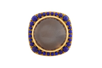 Lot 244 - A MOONSTONE AND LAPIS RING