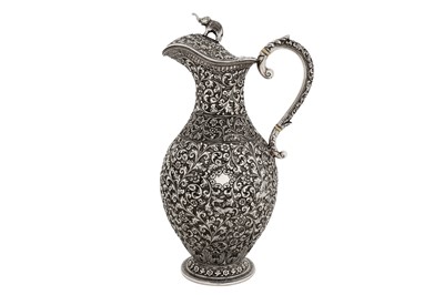 Lot 142 - A late 19th Anglo – Indian unmarked silver ewer or claret jug, Cutch circa 1880