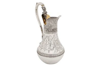 Lot 347 - A Victorian sterling silver ewer or claret jug, London 1868 by Thomas Bradbury and Sons