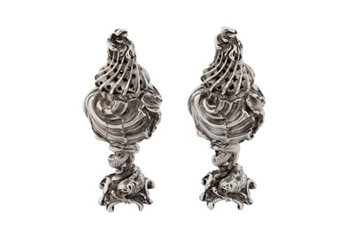 Lot 229 - A pair of mid-19th century French cast 950 standard silver peppers, Paris circa 1850, maker’s mark obscured