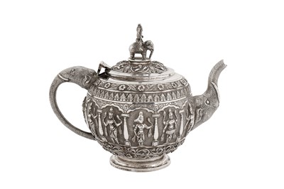 Lot 128 - A late 19th century Anglo – Indian unmarked silver small teapot, Madras circa 1890