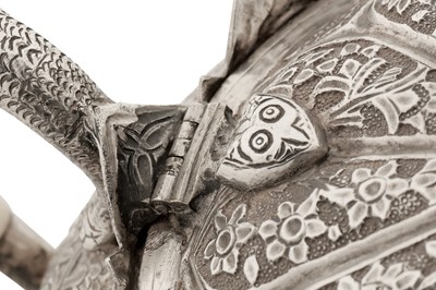 Lot 110 - A late 19th century Anglo – Indian unmarked silver teapot, Kashmir circa 1890